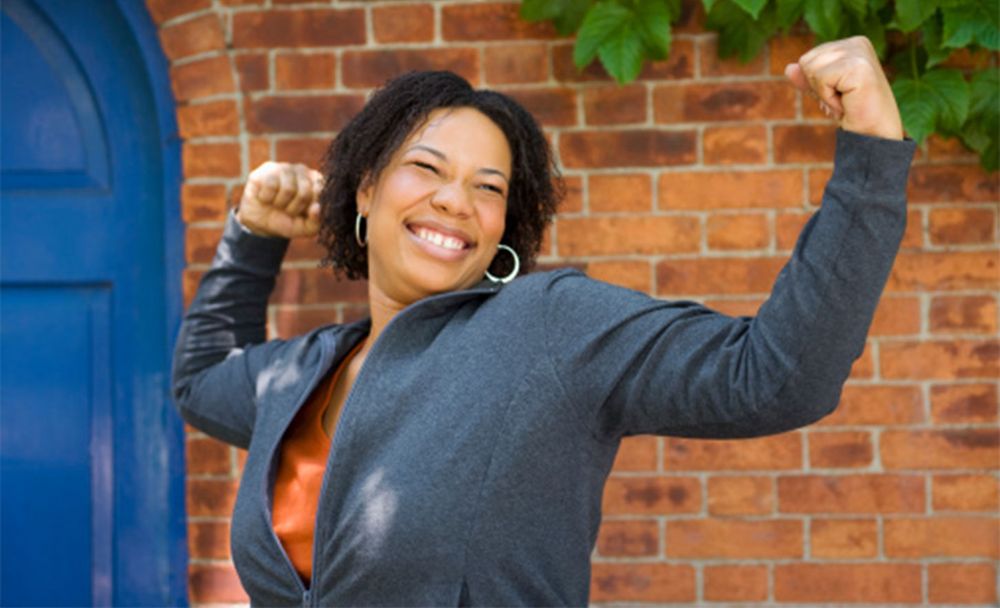 Woman Flexing Arms