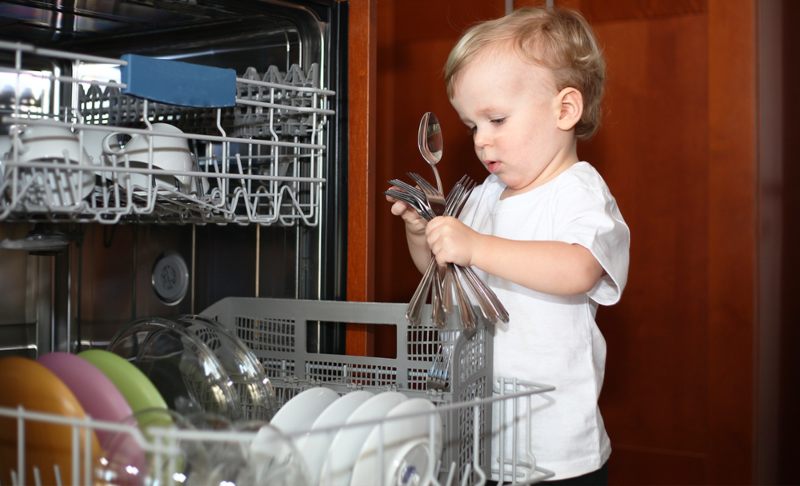 Child Playing with Utensils