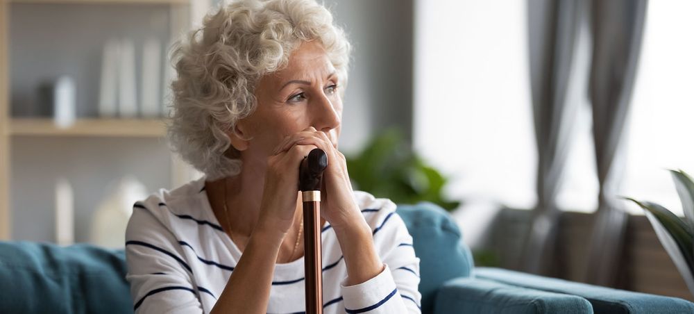 Older Woman Holding a Cane