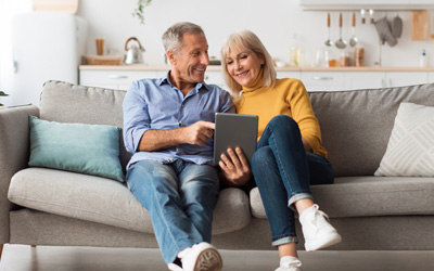 Older couple using a tablet