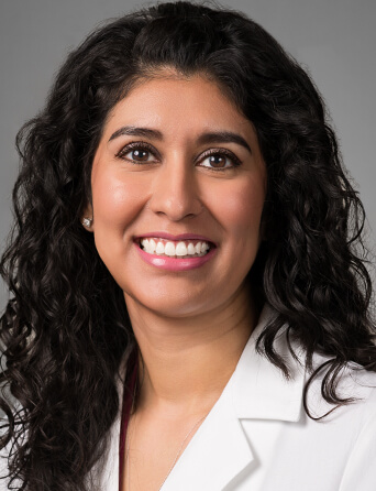 Portrait of Violetta Chaires Vasquez, MD, FACOG, OB/GYN specialist at Kelsey-Seybold Clinic.